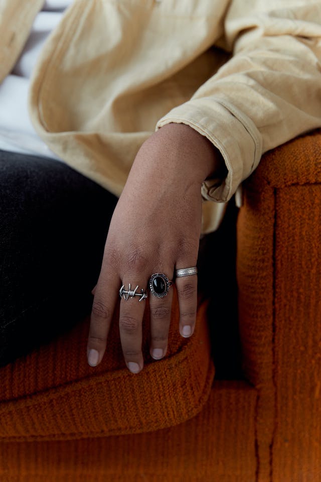 Sterling silver rings on fingers